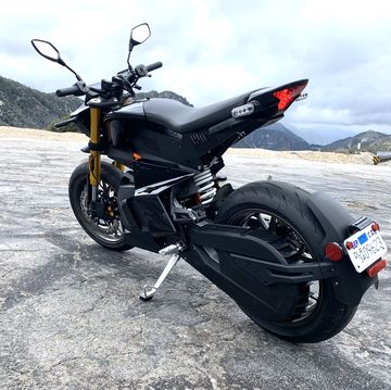 a motorcycle parked on a beach