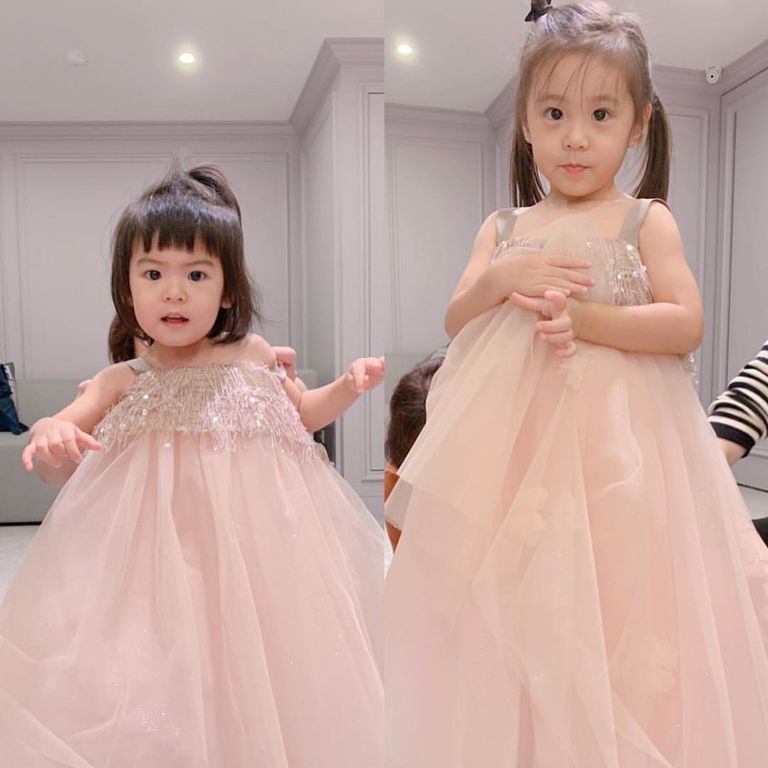Dress, Child, White, Gown, Pink, Clothing, Shoulder, Bridal party dress, Skin, Hairstyle, 