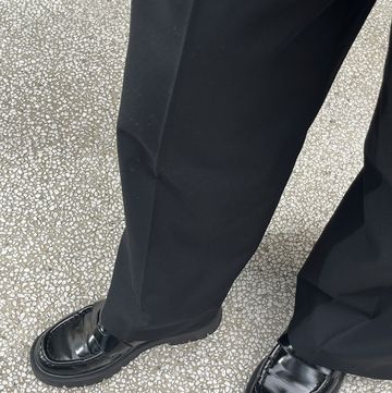 a person's legs and shoes