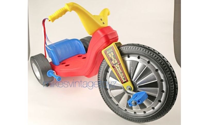 Vehicle, Tire, Toy, Tricycle, Automotive tire, Spoke, Wheel, Motorcycle, Bicycle part, Rim, 