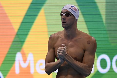 usa's michael phelps prepares to compete in a men's 100m butterfly heat during the swimming event at the rio 2016 olympic games at the olympic aquatics stadium in rio de janeiro