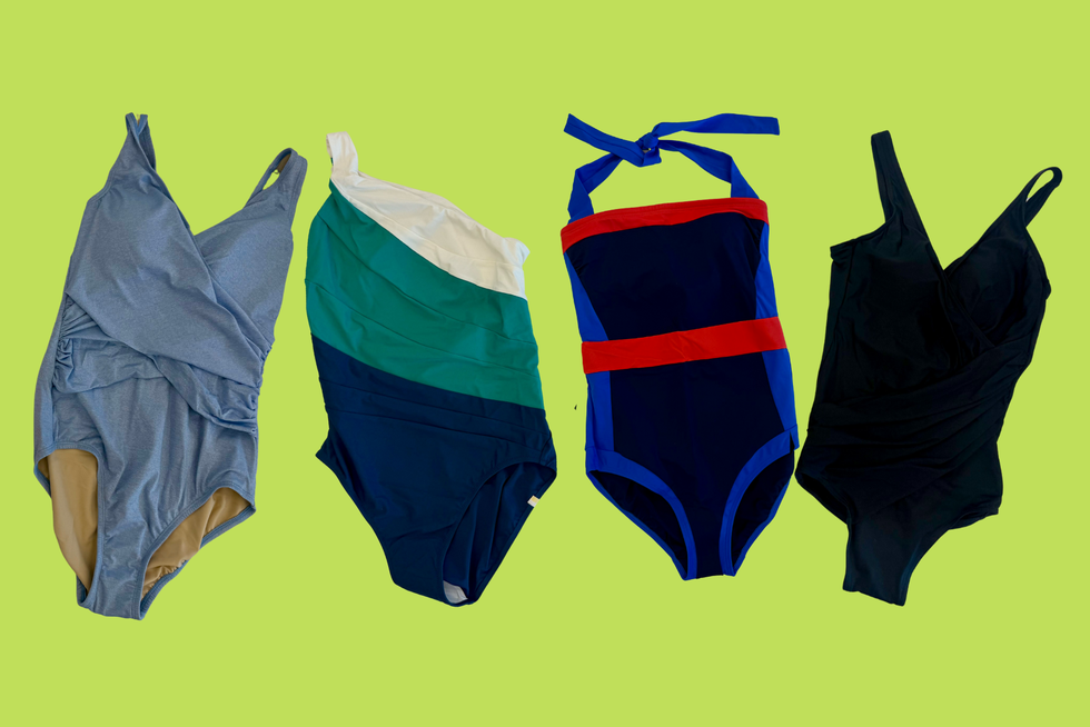 best swimsuits for women over 50 - swimsuits four swimsuits lying against a green background