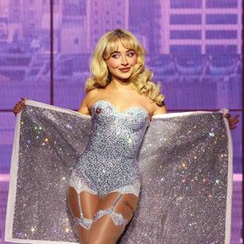 sabrina carpenter wears silver sequined dress