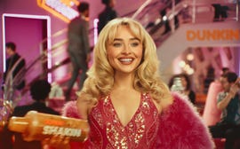 sabrina carpenter shaking her dunkin' donuts shakin' espresso