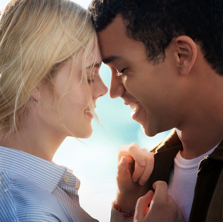 elle fanning and justice smith embrace in a scene from all the bright places, a good housekeeping pick for best sad movies on netflix