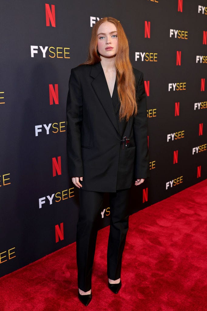 Sadie Sink is all grown up wearing just a bra with oversized suit