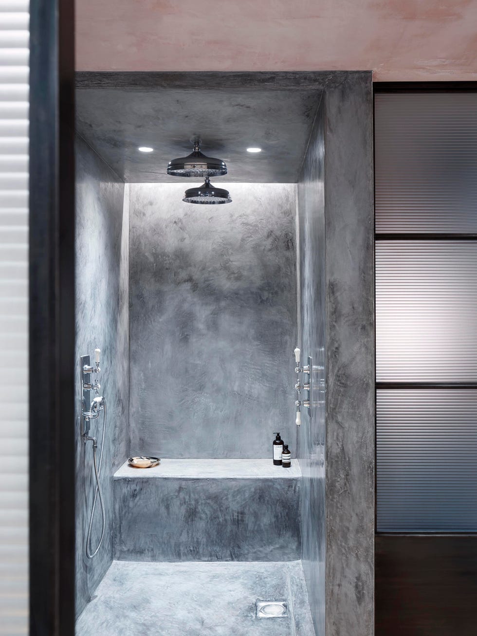 minimalist grey bathroom with brushed plaster finish
