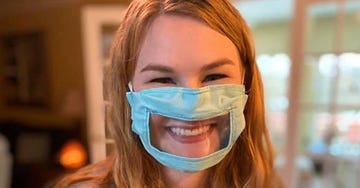 Face, Duct tape, Facial expression, Head, Mouth, Helmet, Personal protective equipment, Cheek, Mask, Smile, 