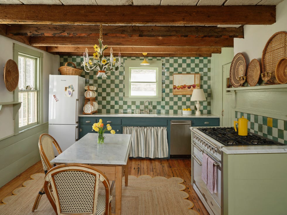 rustic farmhouse kitchen with green cabinetry