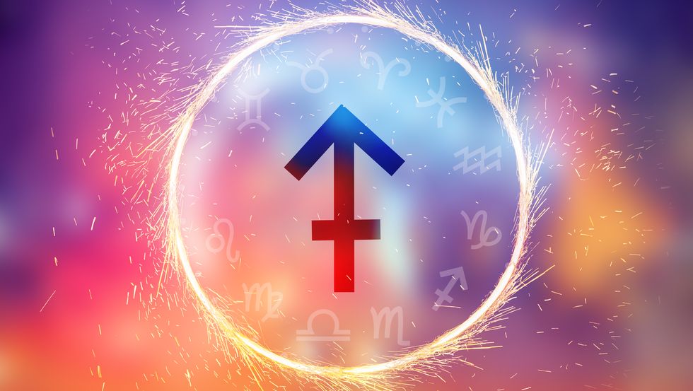 sagittarius symbol on a colorful background light