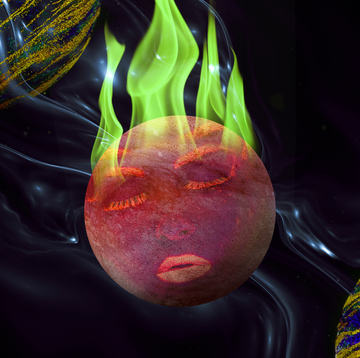 a planet with a face on fire