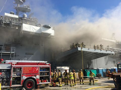 navy ship uss bonhomme richard burns at naval base in san diego