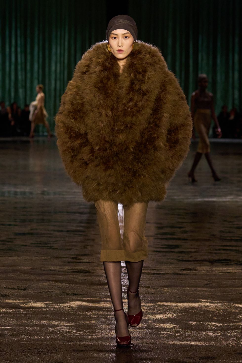 a person wearing a fur coat