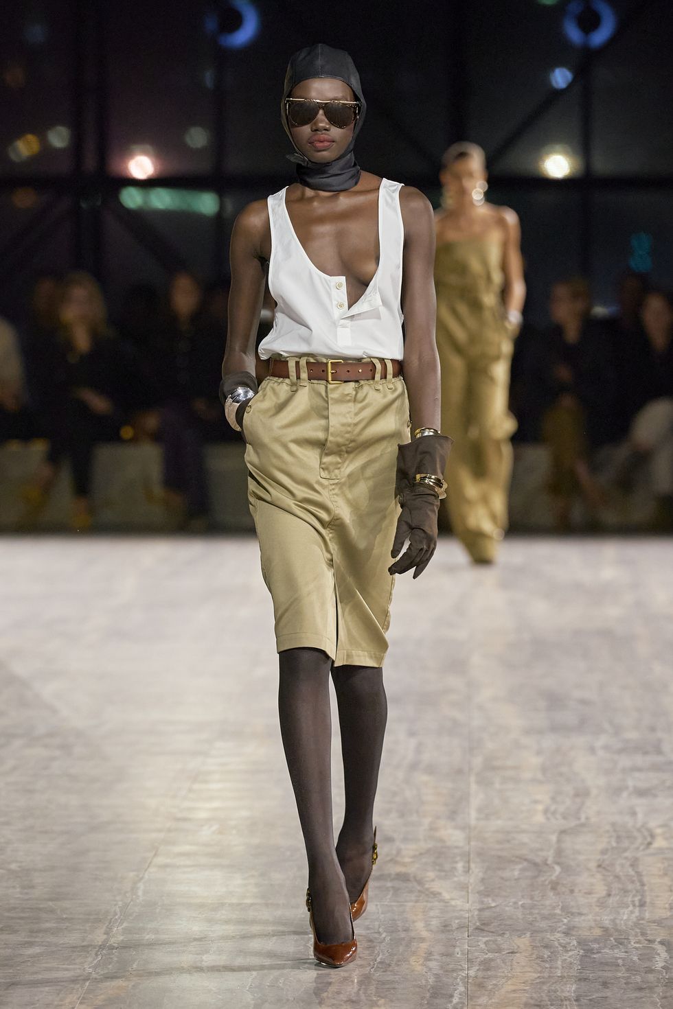 a person walking on a runway
