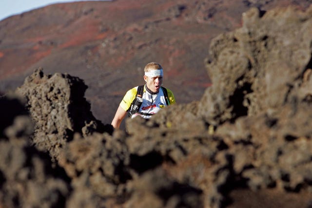 a man runs during the 14th edition of th