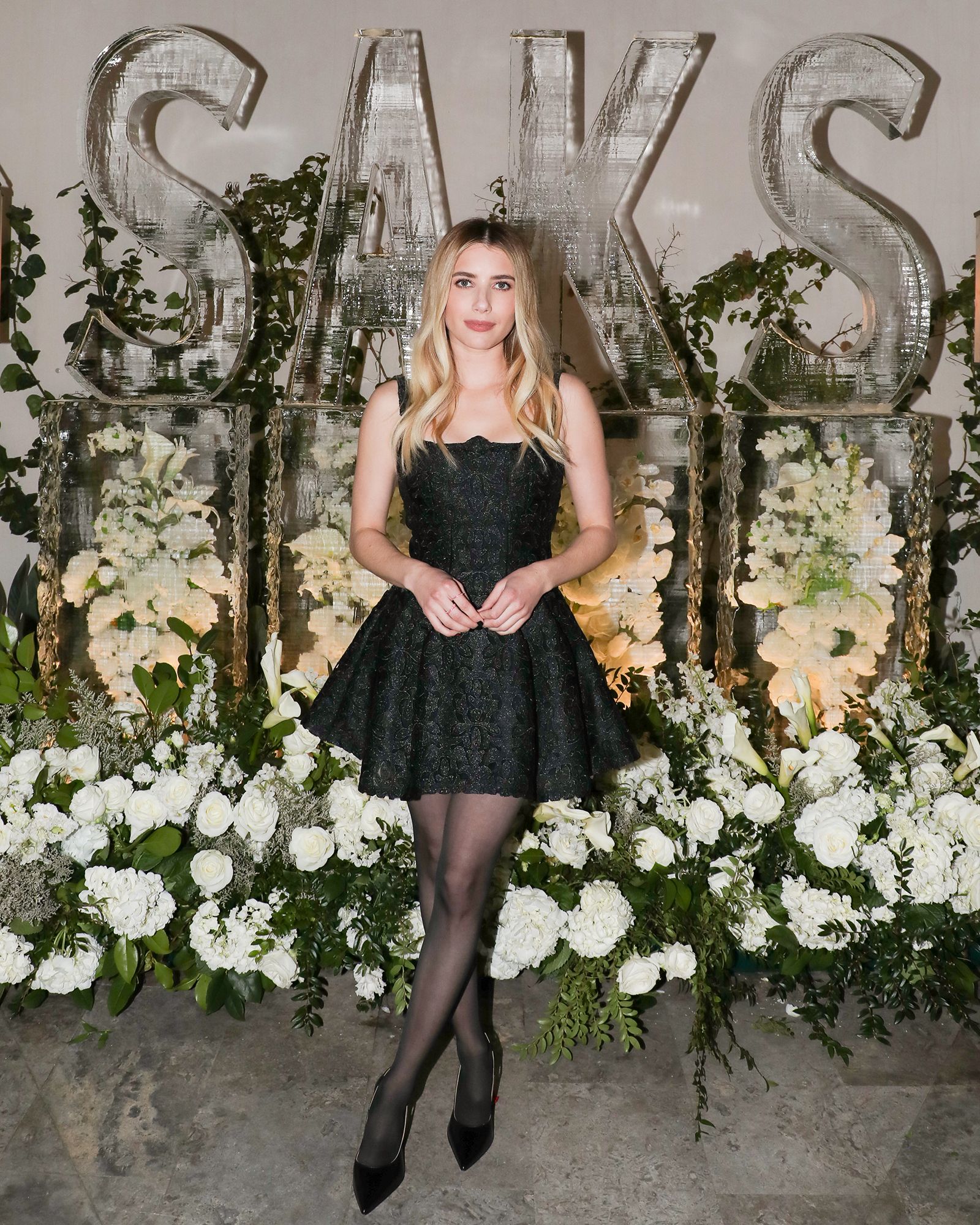 Emma Roberts Wears Bottega Veneta Jodie Bag To Saks New York Fashion Week  Party – WWD