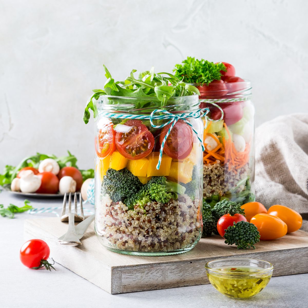 Salad in glass jar with quinoa