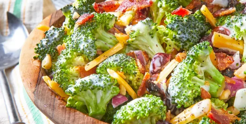 broccoli salad in wood bowl
