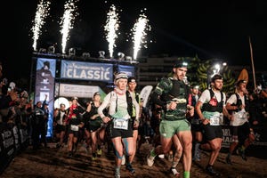 a group of people running in a race