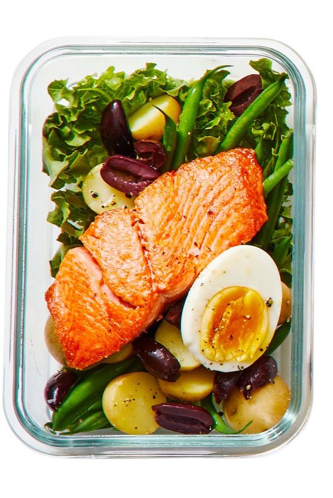 salmon nicoise salad in a glass container