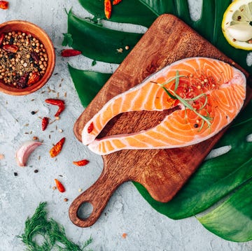 Salmon. Raw trout red fish steak with ingredients for cooking. Cooking Salmon, sea food. Healthy eating concept salmon raw trout red fish steak with ingredients for cooking cooking salmon, sea food healthy eating concept