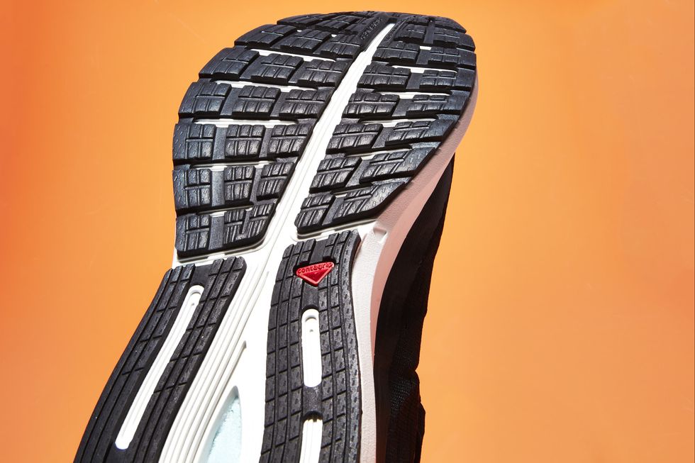 Orange, Footwear, Shoe, Tire, Bicycle tire, Architecture, Synthetic rubber, 