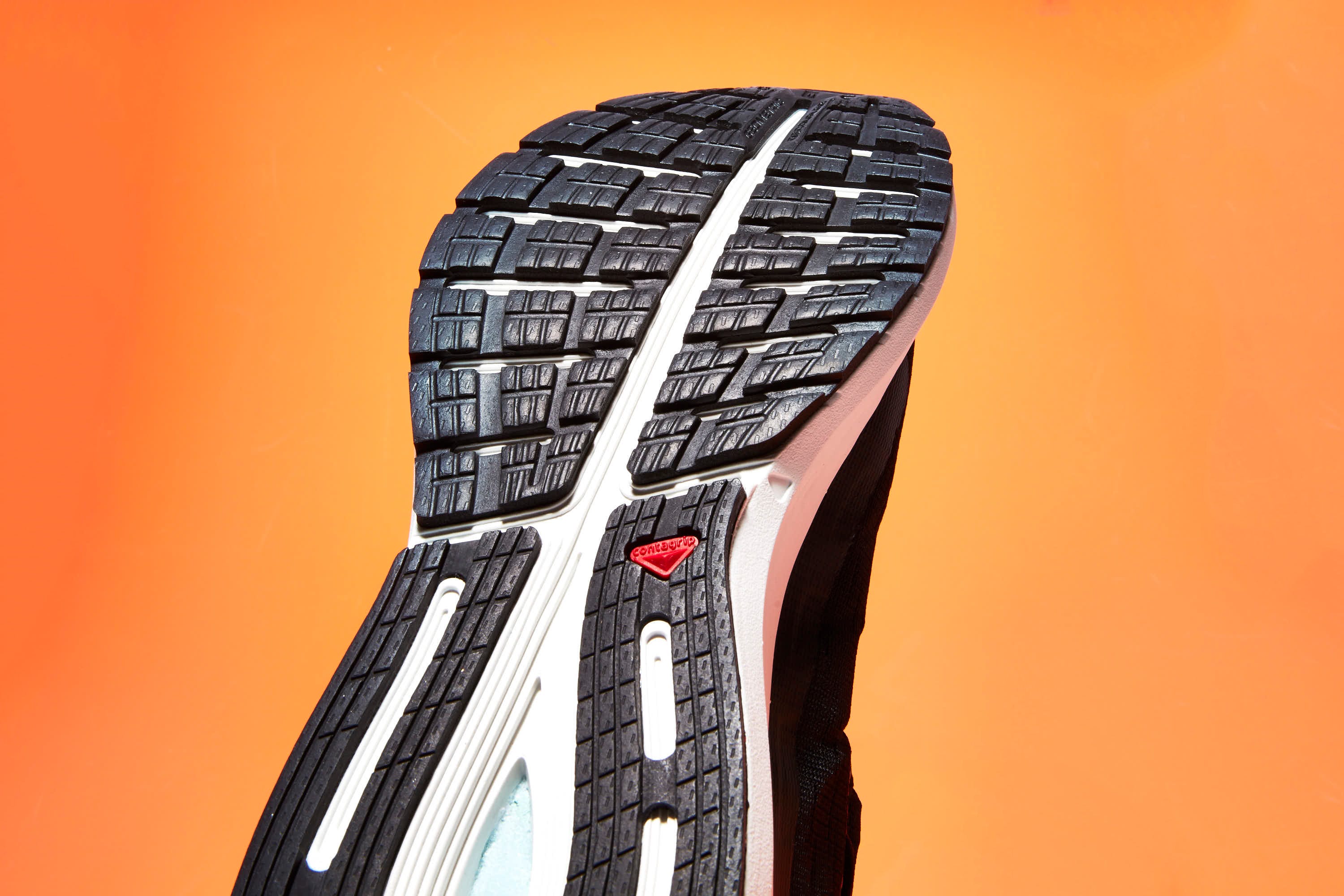 Orange, Footwear, Shoe, Tire, Bicycle tire, Architecture, Synthetic rubber, 