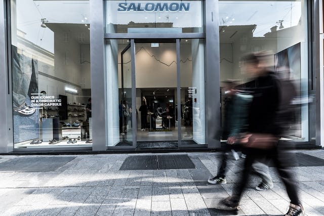 salomon retail store front with pedestrians passing by