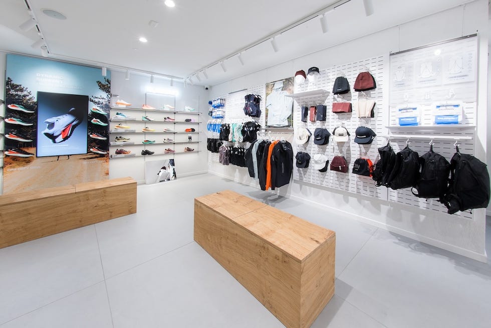 sporting goods store interior showcasing footwear and apparel