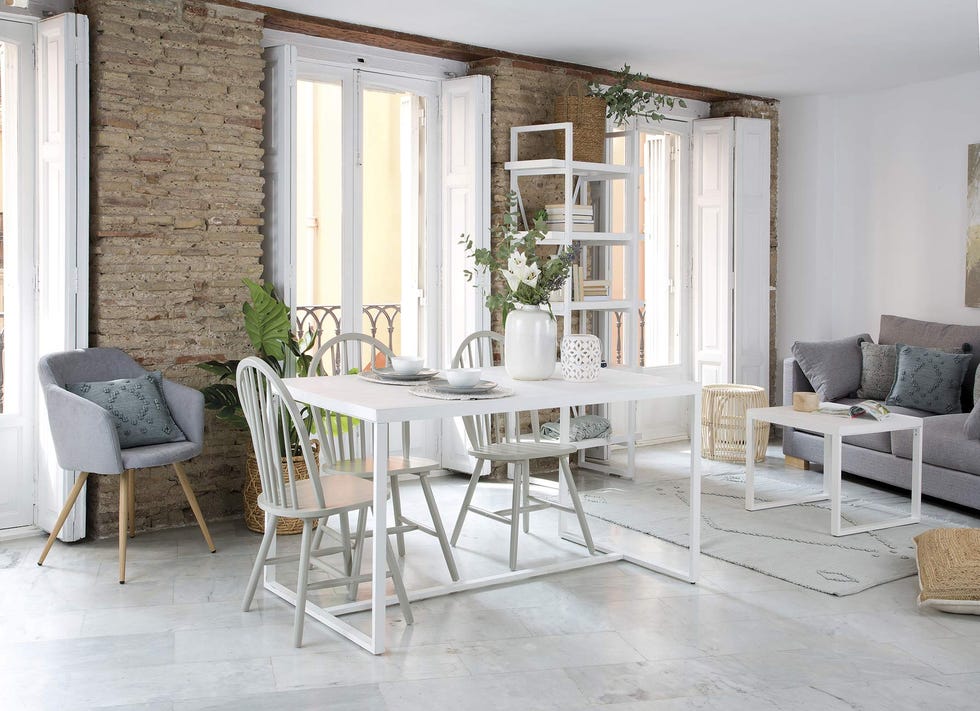 salón comedor de estilo moderno en blanco y gris