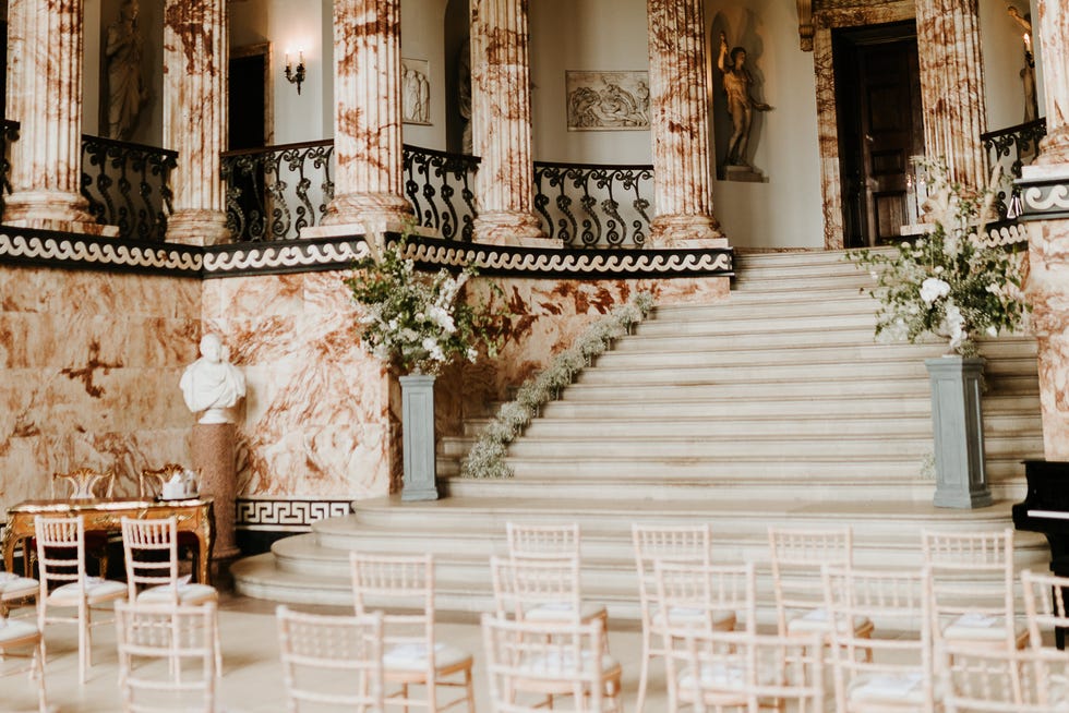 a room with chairs and tables