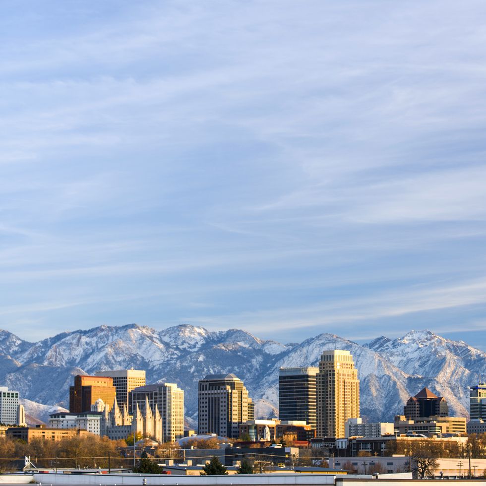 salt lake city with snow capped mountain