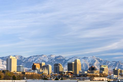 salt lake city with snow capped mountain