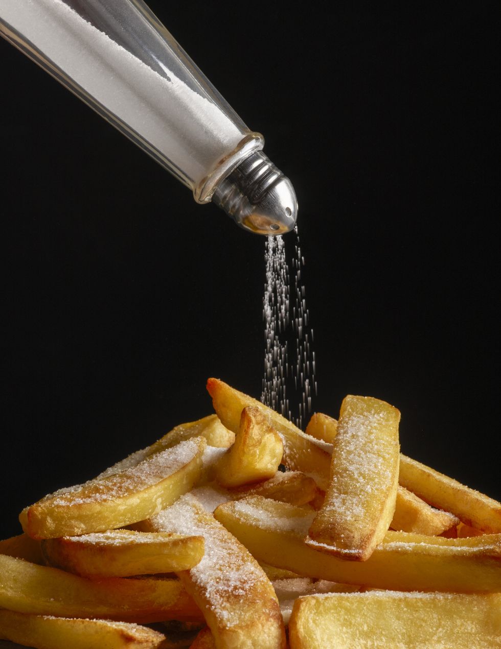 salt pouring onto chips