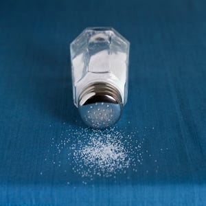 Salt spilling out of salt shaker