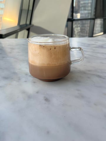 a clear coffee mug filled with a homemade salted caramel mocha latte drink