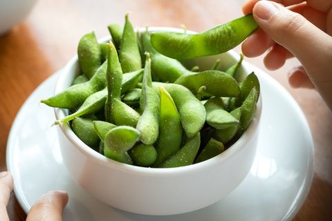 pov, salted edamame beans, eating japanese food by hand