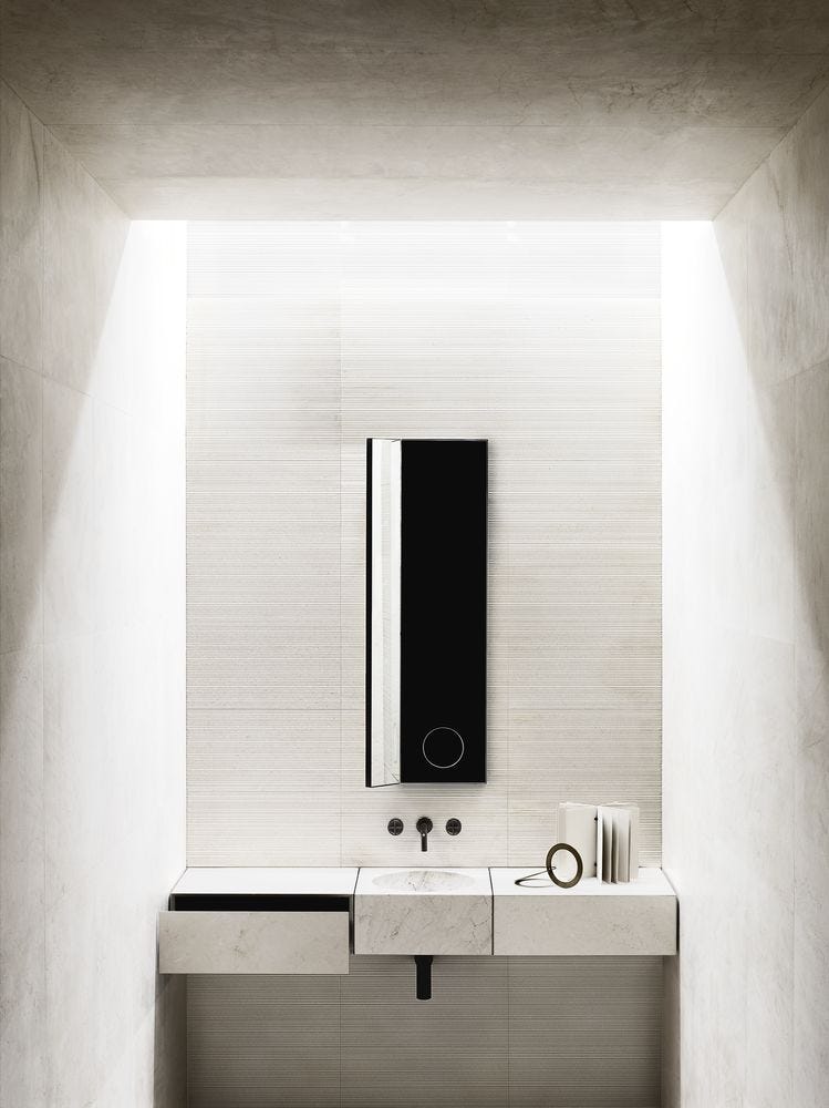 Bathroom vanity with marble sink and bamboo style ribbed tiles