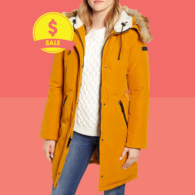Clothing, Hood, Yellow, Outerwear, Coat, Parka, Overcoat, Jacket, Orange, Fur, 