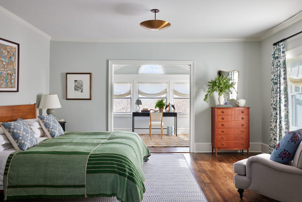 sunny bedroom with blues and greens