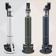 three white green and blue vacuums