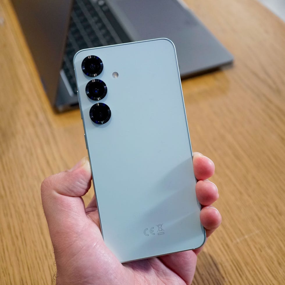 modern smartphone showcasing a sleek design with three rear cameras