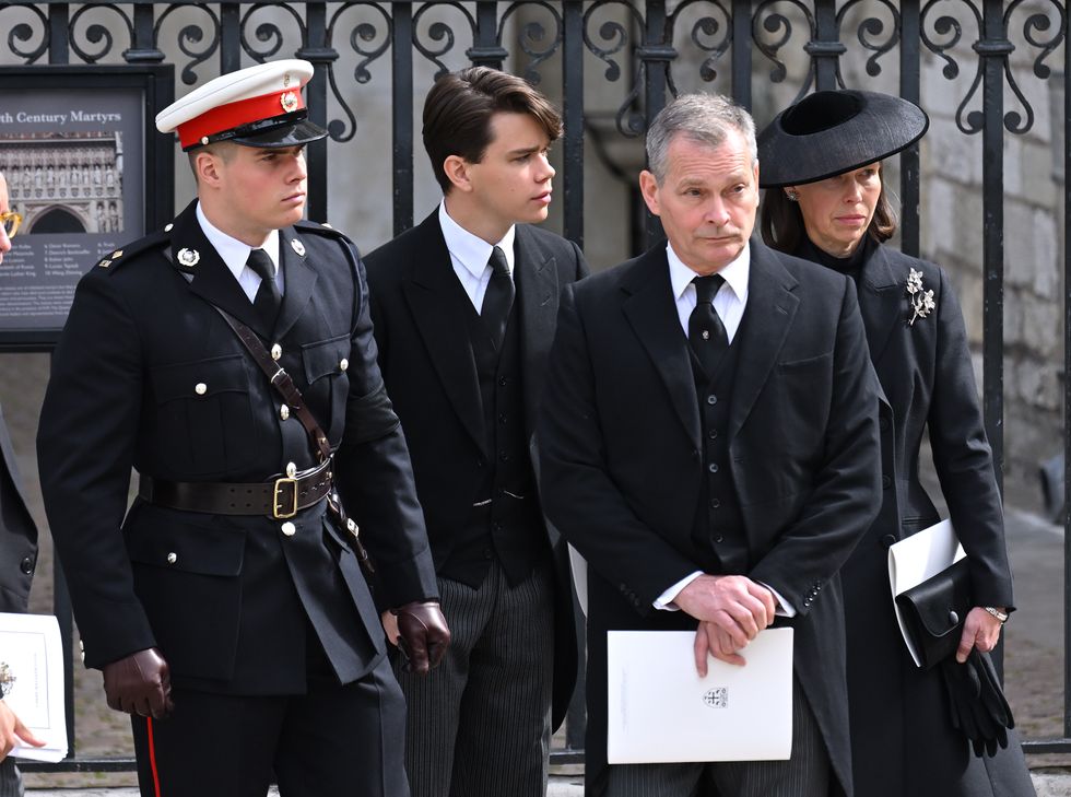 arthur chatto, left, in his royal marines uniform at the queen's funeral with his brother and parents﻿
