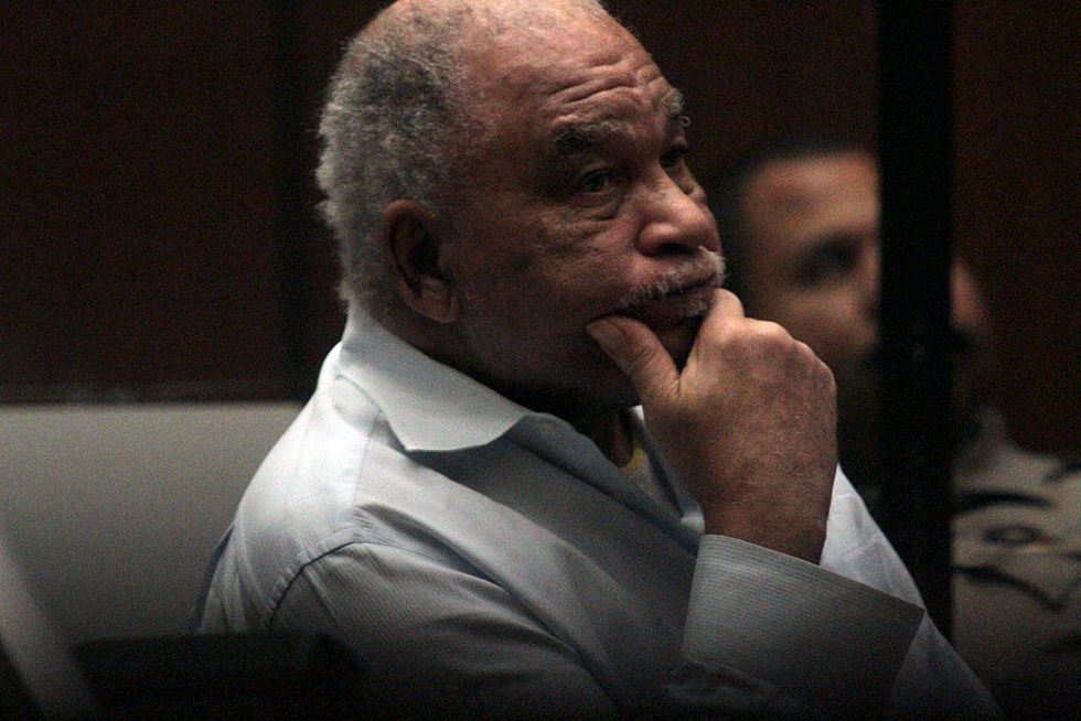 samuel little resting his head on his hand as he listens to statements in a courtroom