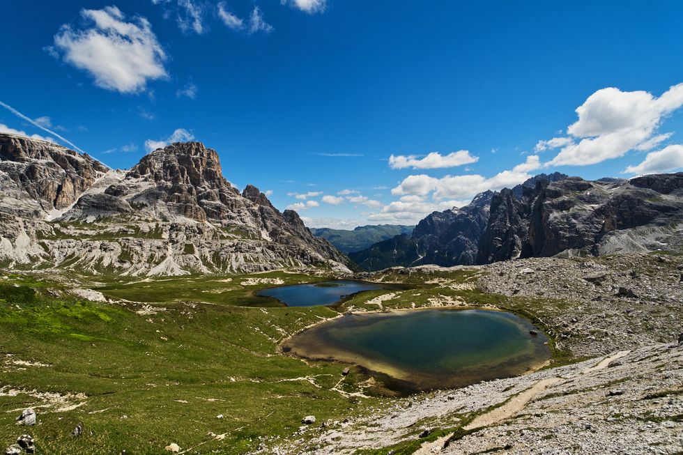 view of the laghi dei piani with the crodon di san candido in background at the dolomites in italy