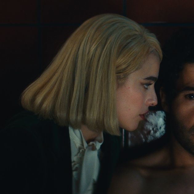 Inside a luxurious, 45th-floor hotel suite, a young, blonde-haired lawyer visits the anxious heir to a hotel empire and begins a business meeting. Armed with a briefcase of documents, Rebecca (Margaret Qualley) runs Hal (Christopher Abbott) through a questionnaire as he prepares to take over his late father’s company. But the legal formalities take a hard pivot when Rebecca begins asking about his height, weight, and sexual history. It’s not long before she demands that he strip half-naked in the bathroom and scrub the back of the toilet, all while she watches from a chair, reveling in her client’s belittled efforts. Though she deviates a bit, Rebecca is just following the script that Hal has written, verbally sparring and embarrassing him without physical contact until she lets him masturbate and climax on the floor.

<br><br>That’s how <I>Sanctuary</I>, a sly, sleek, sexy two-hander from director Zachary Wigon and writer Micah Bloomberg, starts its riveting dialectic about power, performance, and identity. When the charade ends (she removes her wig, he puts on his shirt), the pair gorges on some room-service dinner before Hal gifts her a $32,000 watch and informs his longtime dominatrix that he’ll no longer need her services. After years of enlisting Rebecca to act out his darkest psychological fantasies, he believes he must rid himself of any sordid liabilities ahead of owning his father’s business. “What we do is so meaningful,” he tells her. “But it’s just not something that goes with the next stage of my life.”

<br><br>Initially puzzled, Rebecca ultimately agrees to end her professional relationship, but after pausing by the elevator, she gets an epiphany.