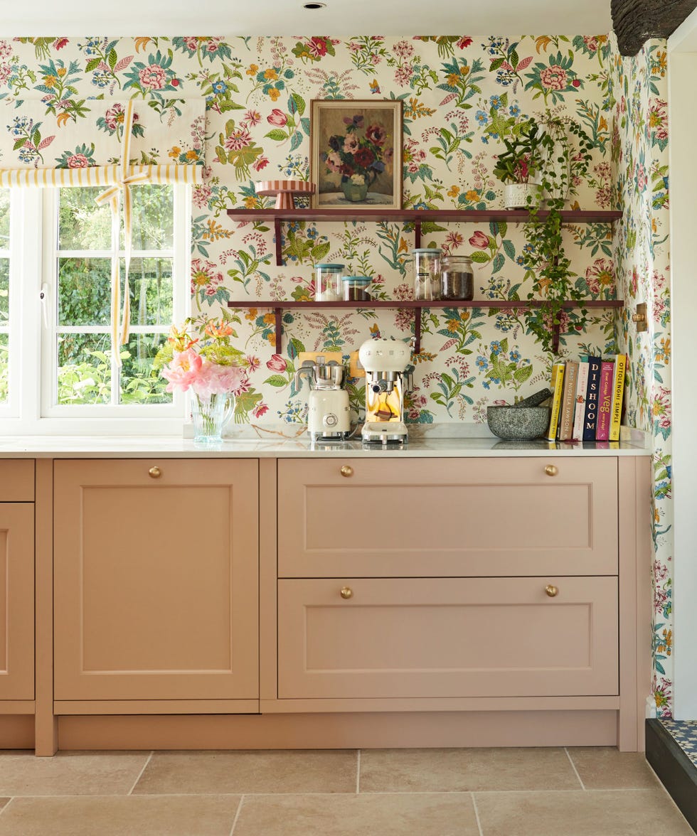 Shaker style kitchen with open shelves and a colorful floral wallpaper