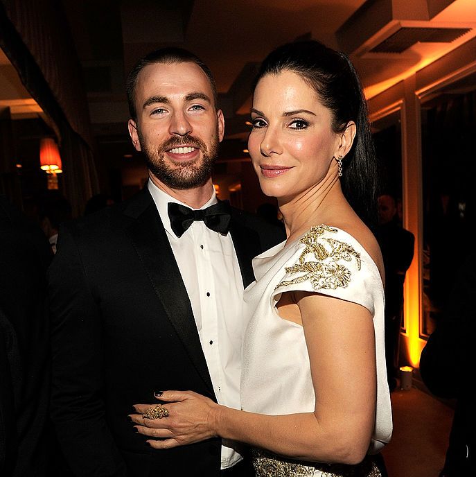 west hollywood, ca february 26 exclusive access special rates apply no north american on air broadcast until march 1, 2012 chris evans and sandra bullock attend the 2012 vanity fair oscar party hosted by graydon carter at sunset tower on february 26, 2012 in west hollywood, california photo by kevin mazurvf12wireimage