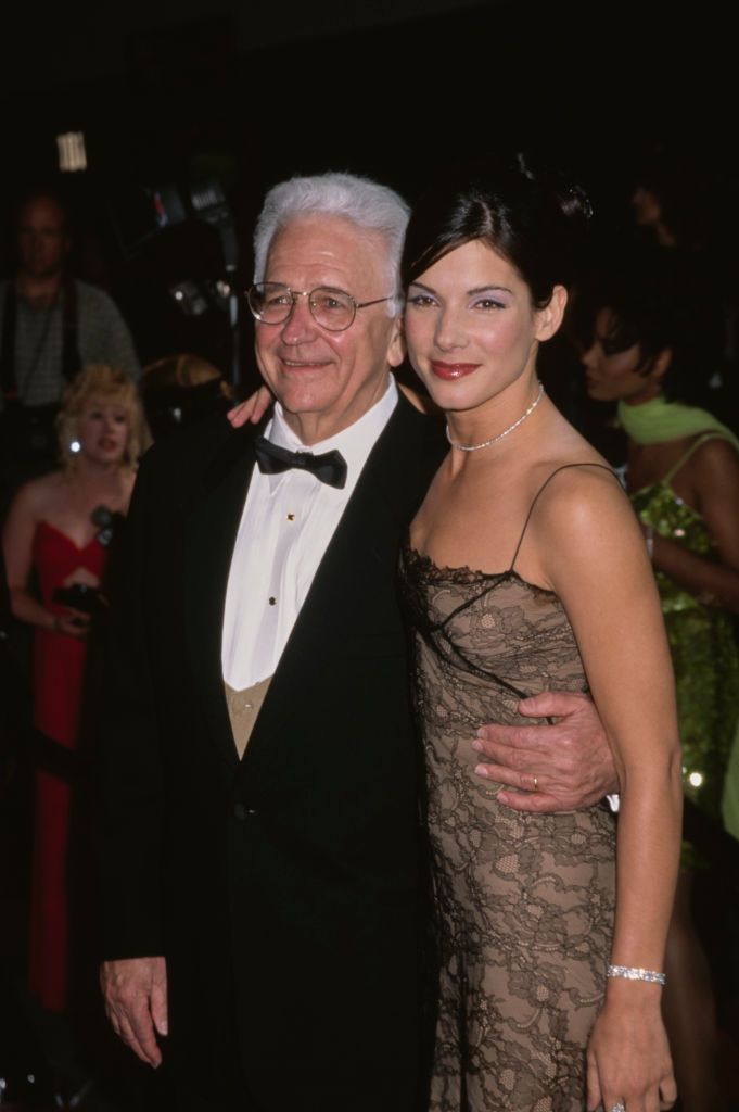 american voice coach john wilson bullock 1925�2018 and his daughter, american actress sandra bullock attend the 22nd annual peoples choice awards, held at universal studios in los angeles, california, 10th march 1996 photo by vinnie zuffantegetty images