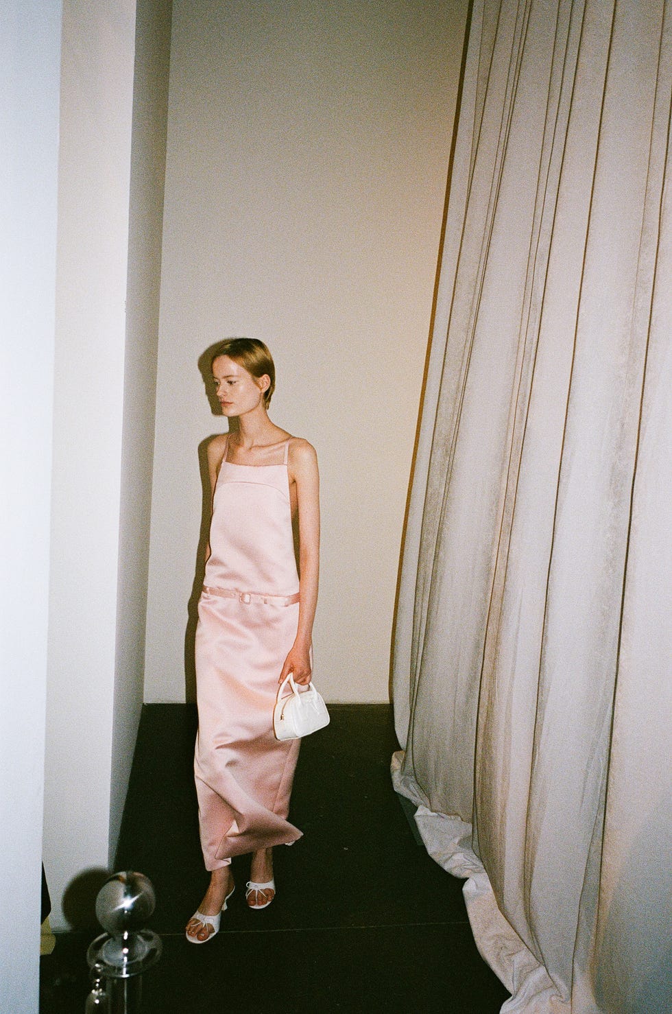 a person in a pink dress